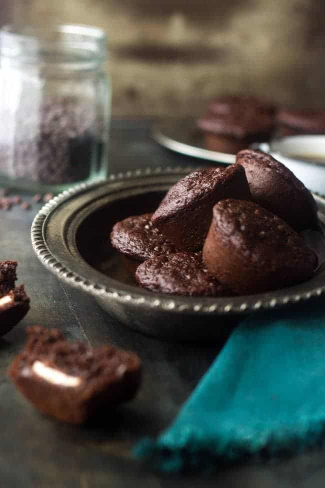 Healthy, Cream-Cheese Filled Chocolate Chip Muffins - Whole wheat and only 150 calories but SO moist and chocolatey! | Foodfaithfitness.com | #muffin #recipe #healthy