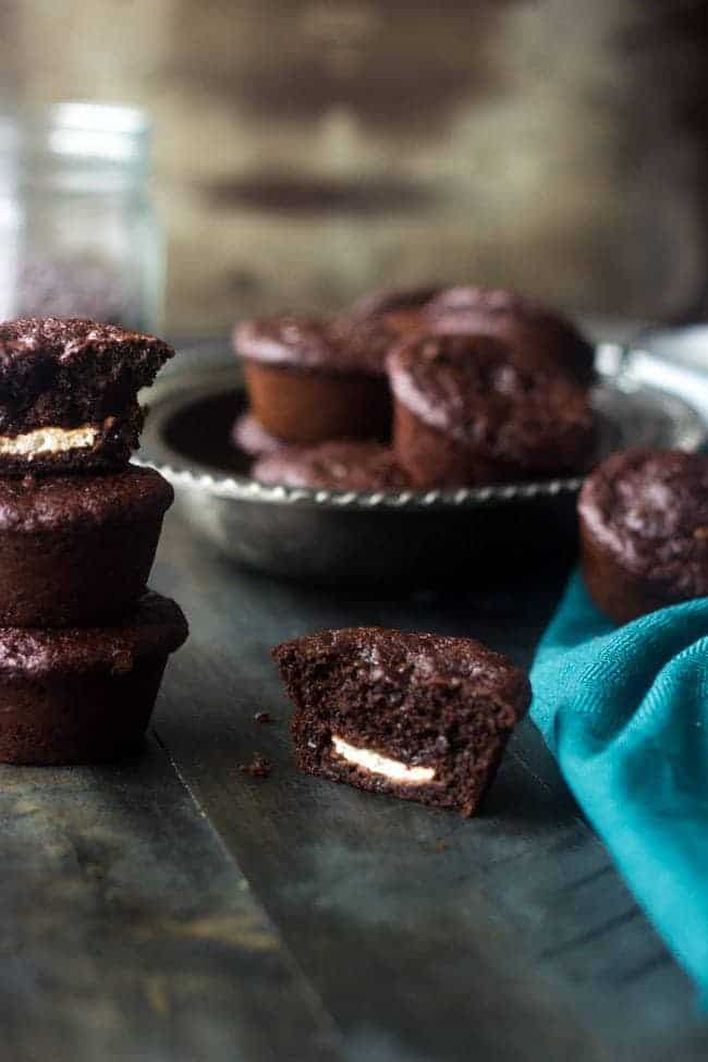 Healthy, Cream-Cheese Filled Chocolate Chip Muffins - Whole wheat and only 150 calories but SO moist and chocolatey! | Foodfaithfitness.com | #muffin #recipe #healthy