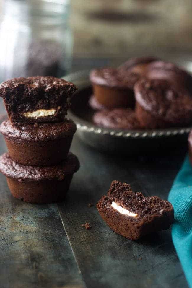 Healthy, Cream-Cheese Filled Chocolate Chip Muffins - Whole wheat and only 150 calories but SO moist and chocolatey! | Foodfaithfitness.com | #muffin #recipe #healthy