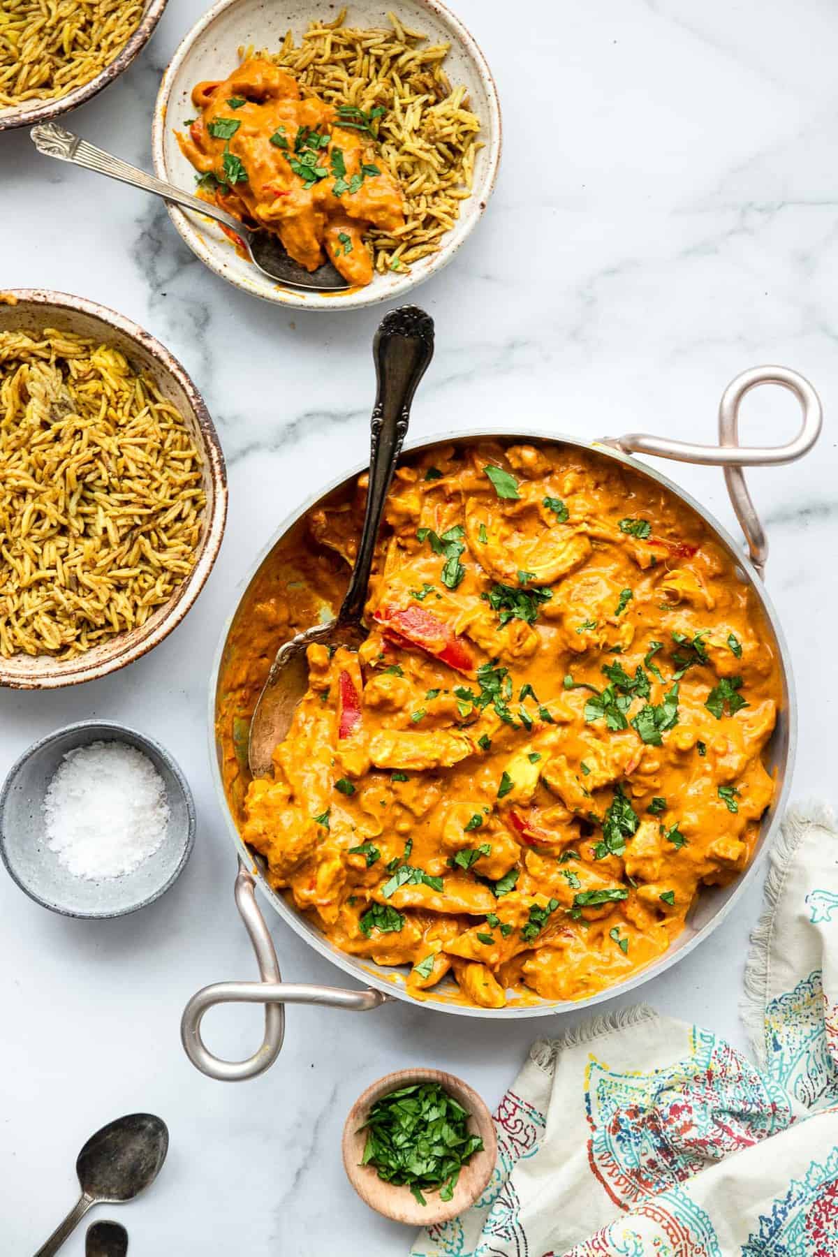 paleo curry in an Indian serving bowl with rice on the side