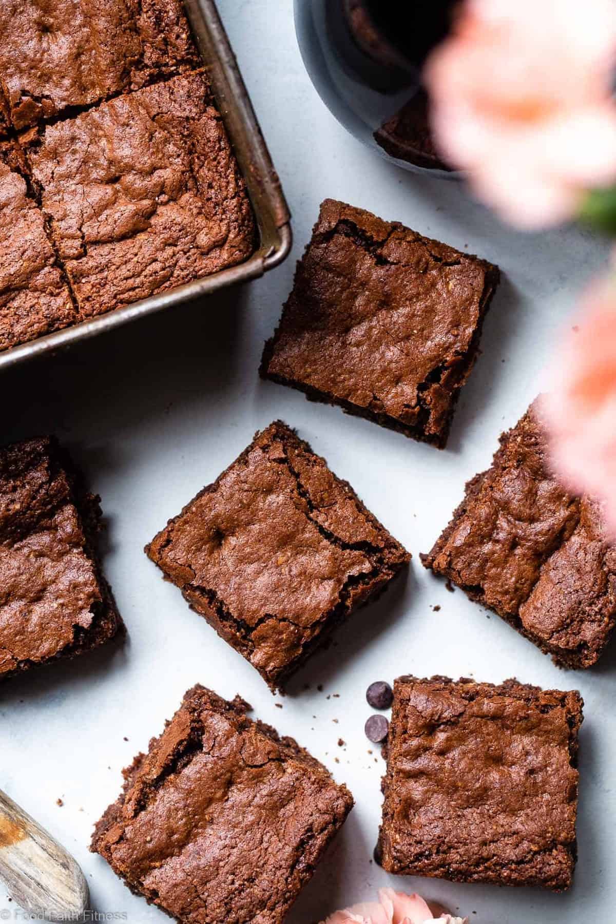 Easy Gluten Free Dairy Free Brownies - These grain free, healthy brownies come together in less than an hour and are SO dense, chewy and FUDGY! Paleo friendly, gluten and dairy free and SO delicious! | #Foodfaithfitness | #Glutenfree #Dairyfree #Paleo #Healthy #Brownies