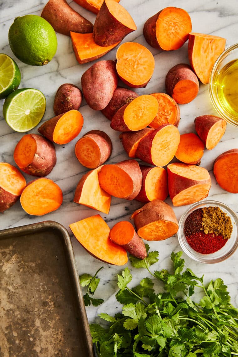 Roasted Sweet Potatoes - Amazingly crisp-tender sweet potatoes roasted to perfection. Such a quick, easy, vegetarian side dish for any meal!