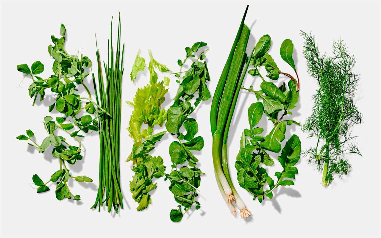 On sunny spring day in the village, two young women gathered herbs from the yard and prepared lavash