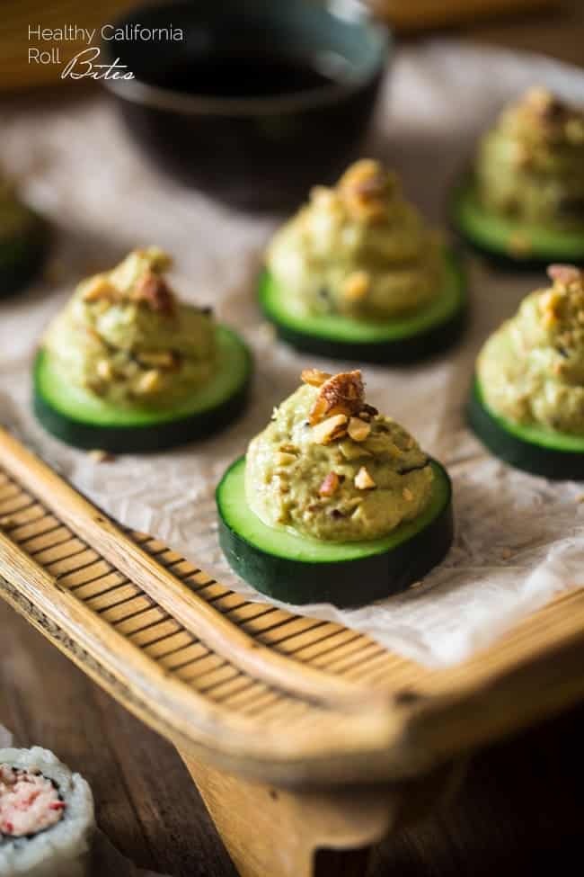 Low Carb California Roll Sushi Bites - Made of creamy Greek yogurt, avocado and crab meat and topped on a cucumber. They're a healthy, low carb and gluten free snack, or appetizer, that tastes like an California Roll, for only 40 calories! | Foodfaithfitness.com | @FoodFaithFit