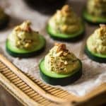 Low Carb California Roll Sushi Bites - Made of creamy Greek yogurt, avocado and crab meat and topped on a cucumber. They're a healthy, low carb and gluten free snack, or appetizer, that tastes like an California Roll, for only 40 calories! | Foodfaithfitness.com | @FoodFaithFit