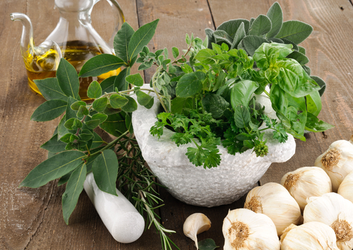 What are the benefits of cooking with herbs and spices?