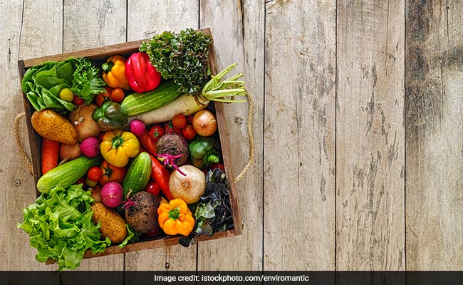 Cooking curry of green organic vegetables in village