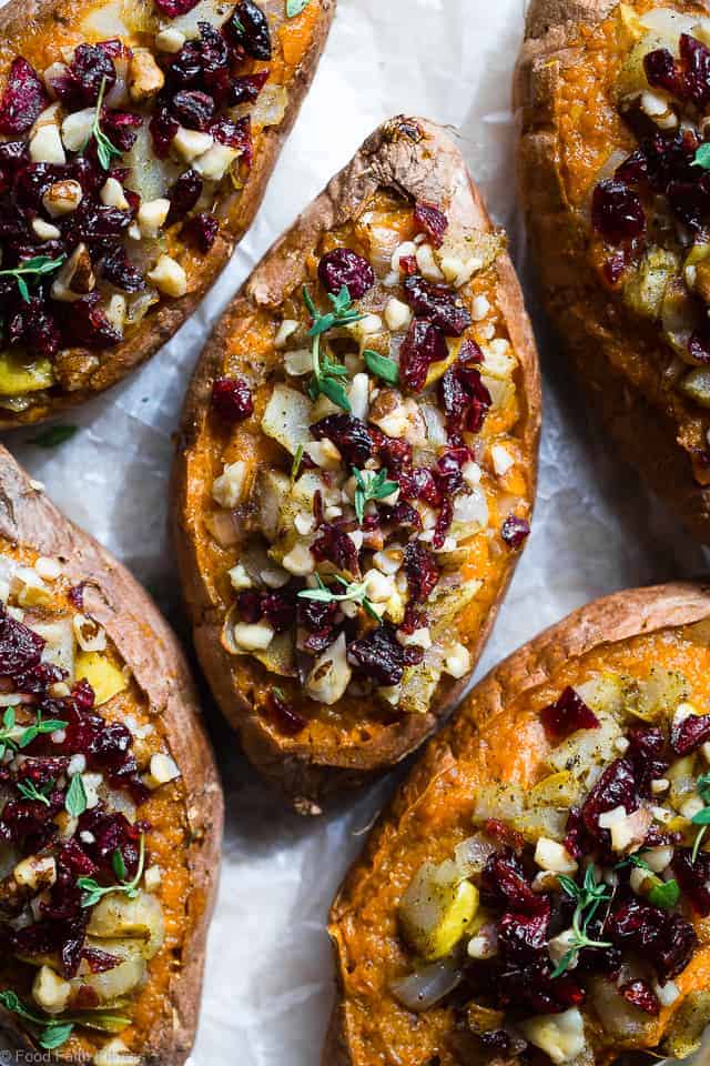 Harvest Paleo Vegan Stuffed Sweet Potatoes - These healthy stuffed sweet potatoes are loaded with cozy, spicy-sweet fall flavors like cranberries, walnuts and pears and are SO easy to make! Gluten, grain and dairy free and whole30 compliant too! | #Foodfaithfitness | #Paleo #Vegan #Glutenfree #Healthy #Whole30