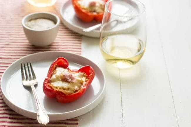 Cordon Bleu Stuffed Peppers - These healthy stuffed peppers taste just like chicken cordon bleu, bit without the carbs and calories! Healthy comfort food at it's finest! | Foodfaithfitness.com | #recipe