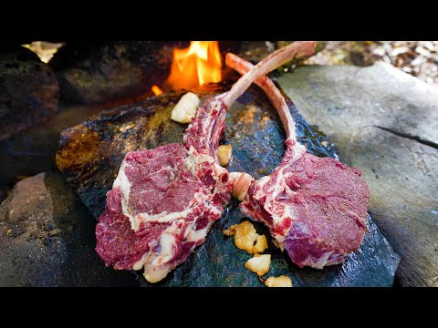 VERY JUICY AND DELICIOUS RIBEYE STEAK COOKED ON A ROCK | PERFECT TOMAHAWK STEAK IN THE WOODS