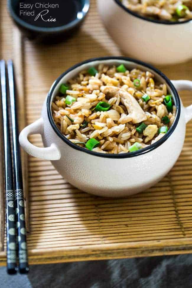 Easy Chicken Fried Rice - This chicken fried rice is better than takeout, and you can eat it without leaving your house! It's a quick, gluten free weeknight dinner that's always a crowd pleaser! | Foodfaithfitness.com | @FoodFaithFit