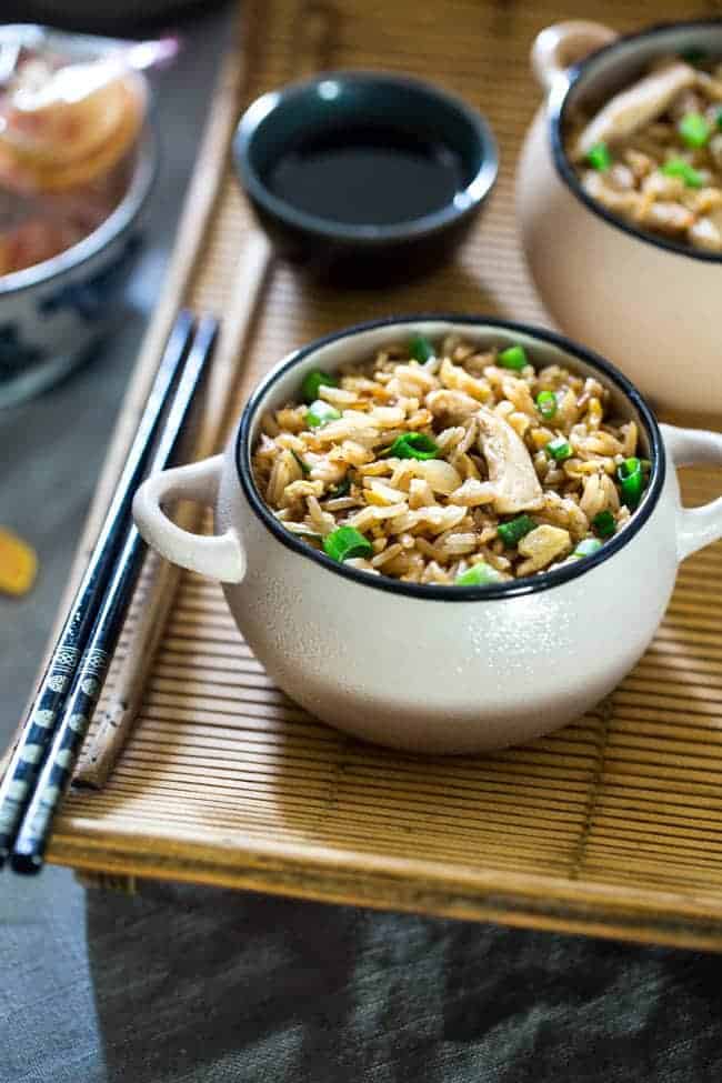 Easy Chicken Fried Rice - This chicken fried rice is better than takeout, and you can eat it without leaving your house! It's a quick, gluten free weeknight dinner that's always a crowd pleaser! | Foodfaithfitness.com | @FoodFaithFit