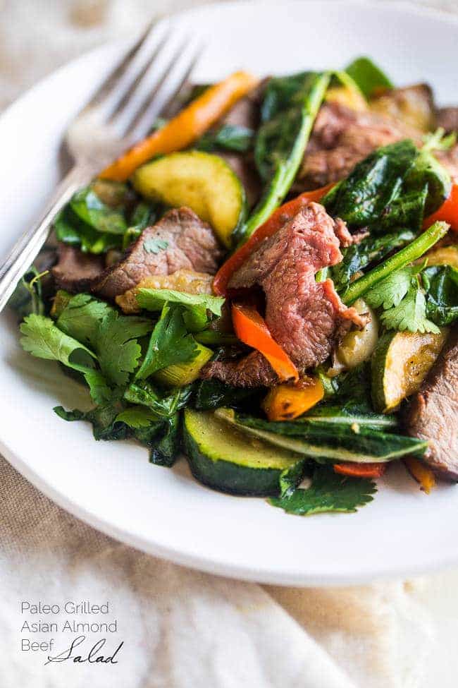 Paleo Grilled Beef Stir Fry with Asian Almond Dressing- Beef and veggies are grilled and then tossed with a creamy Asian almond butter vinaigrette and spinach for a quick and easy, healthy, Paleo-friendly meal! | Foodfaithfitness.com | @FoodFaithFit