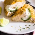 Quinoa Crusted Jalapeno Popper Chicken - This crowd-pleasing chicken tastes like the popular party food, but is made healthy and gluten free with a quinoa crust! Perfect for busy, weeknight meals! | Foodfaithfitness.com | @FoodFaithFit