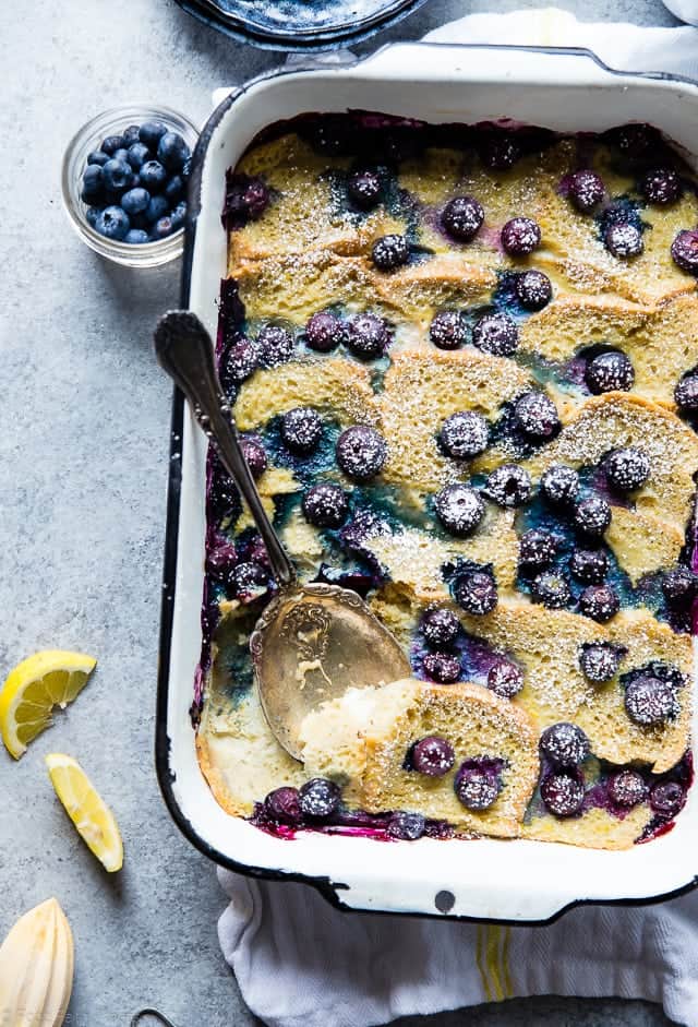 Gluten Free Lemon Blueberry Muffin Breakfast Casserole - This muffin gluten free breakfast casserole is a creative way to use your muffins, and is only 5 ingredients and 200 calories! Perfect for spring brunch or Mother's Day! | Foodfaithfitness.com | @FoodFaithFit