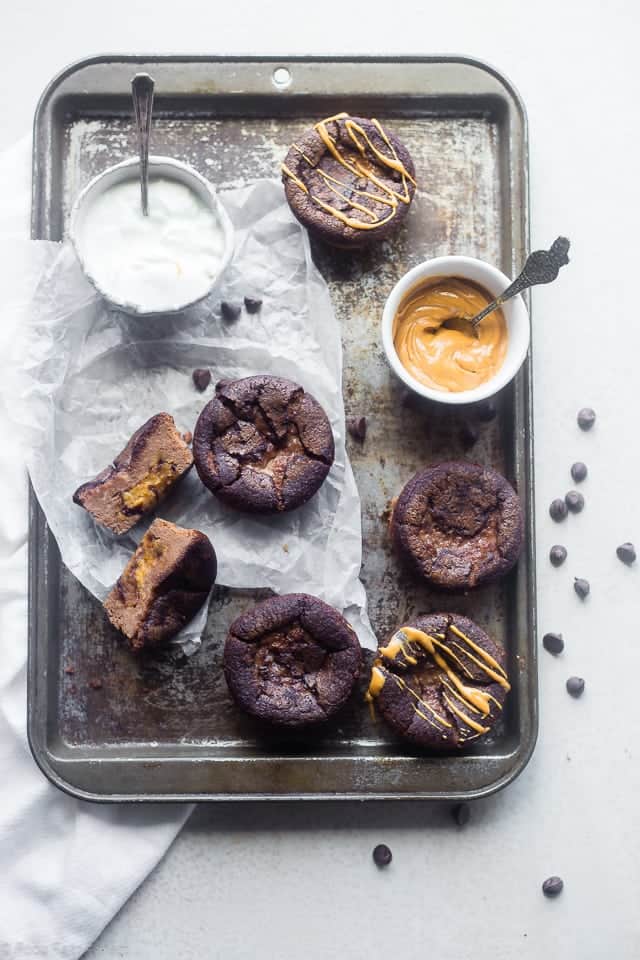 Cookie Dough Chocolate Egg Muffins - These 150 calorie, cookie dough stuffed muffins use a secret ingredient to makes them gluten free and protein packed! An easy, healthy snack or portable breakfast for busy mornings! | Foodfaithfitness.com | @FoodFaithFit