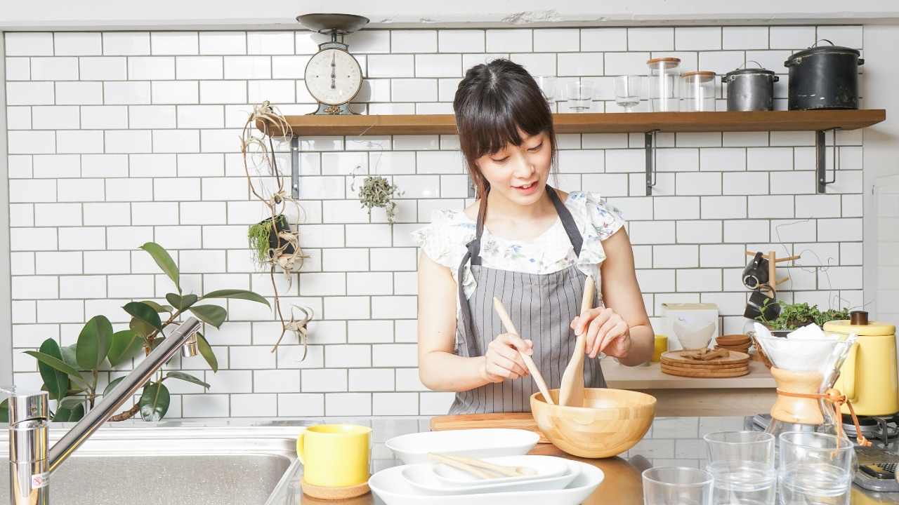 THE WOMAN LIVES ALONE IN THE MOUNTAINS.  Cooking pumpkin porridge in the oven