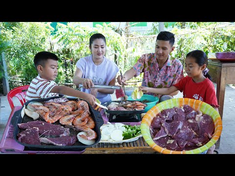 4 country chefs together cooking and eating - Beef, shrimp squid recipe