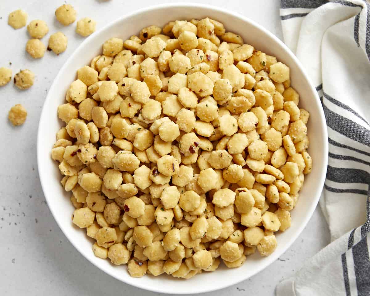 Overhead view of ranch oyster crackers in a white serving bowl.