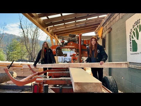 Cutting beams for garage on an LT40 sawmill with my sister