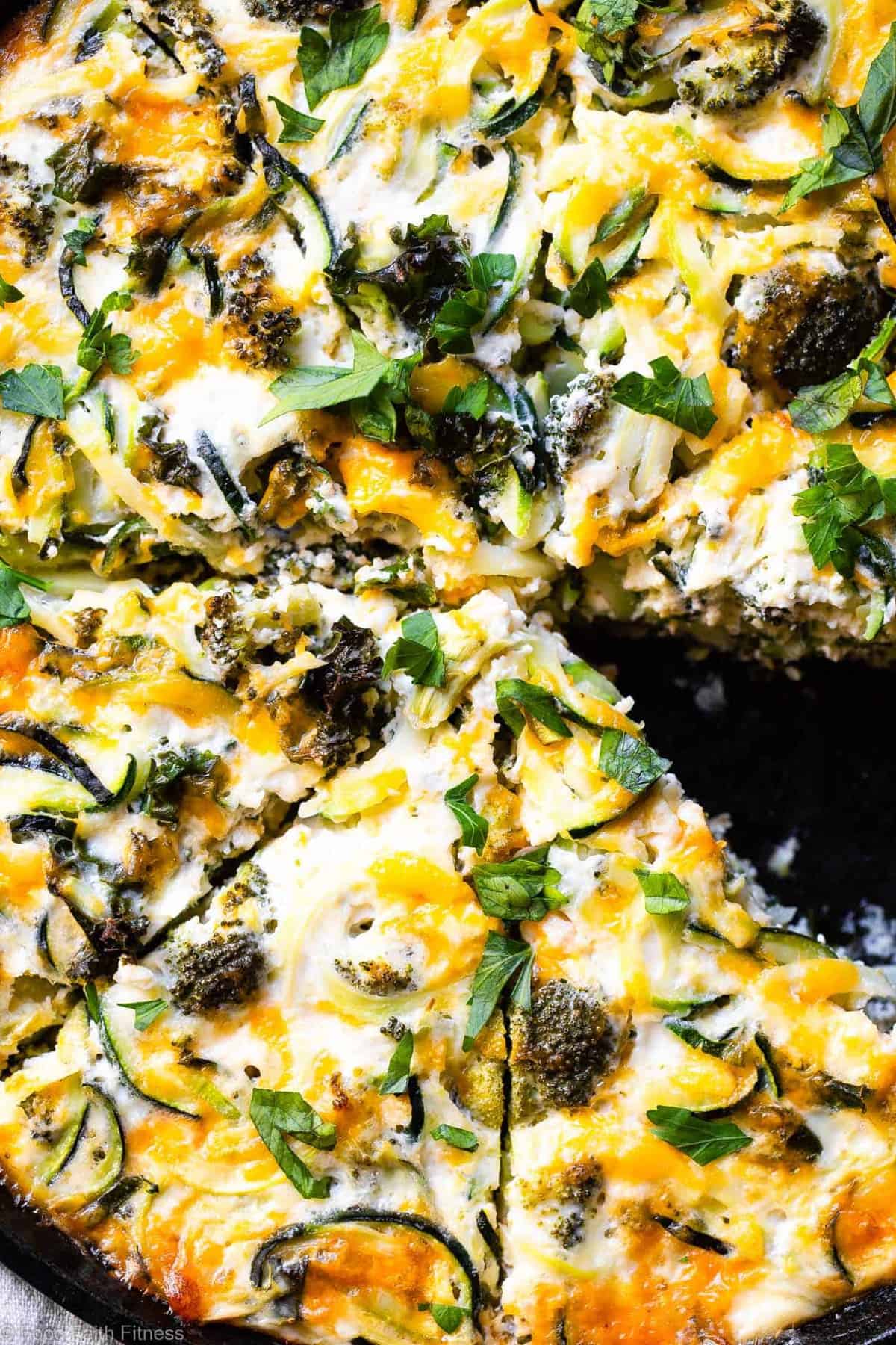 Baked Kale and Broccoli Cheesy Zucchini Casserole - This low carb, gluten free Healthy Baked Cheesy Zucchini Casserole is a quick, easy and healthy dinner that even your kids will love! Protein packed, only 1 Freestyle point and 167 calories too! | #Foodfaithfitness |